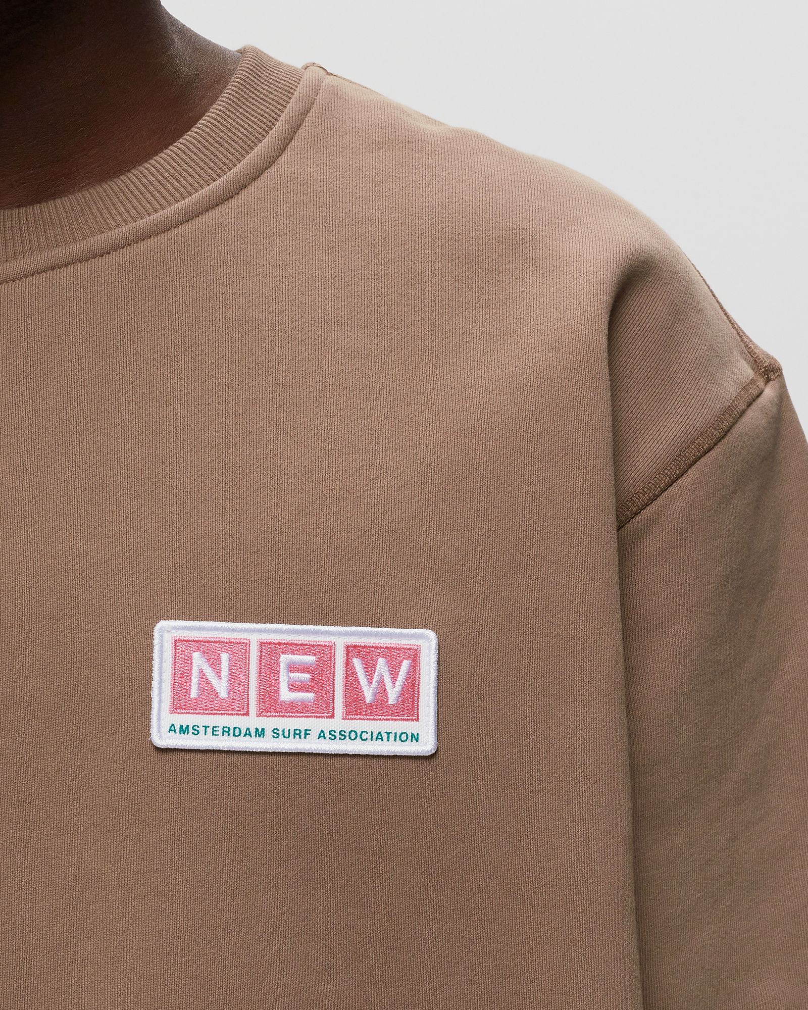 Container logo sweat