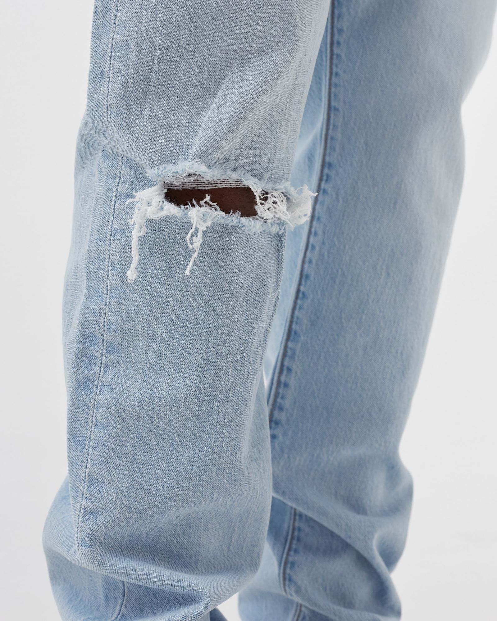 512 SLIM TAPER JEANS