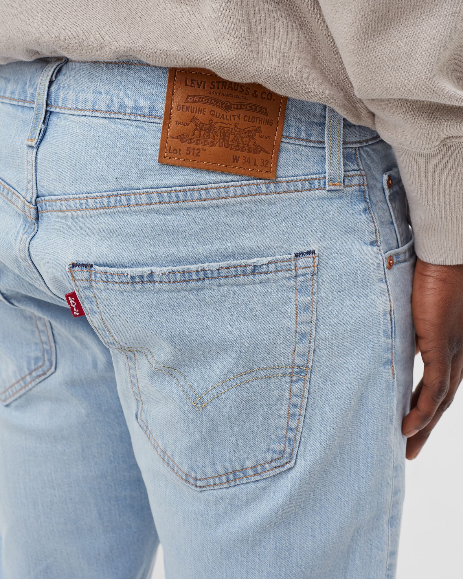 512 SLIM TAPER JEANS