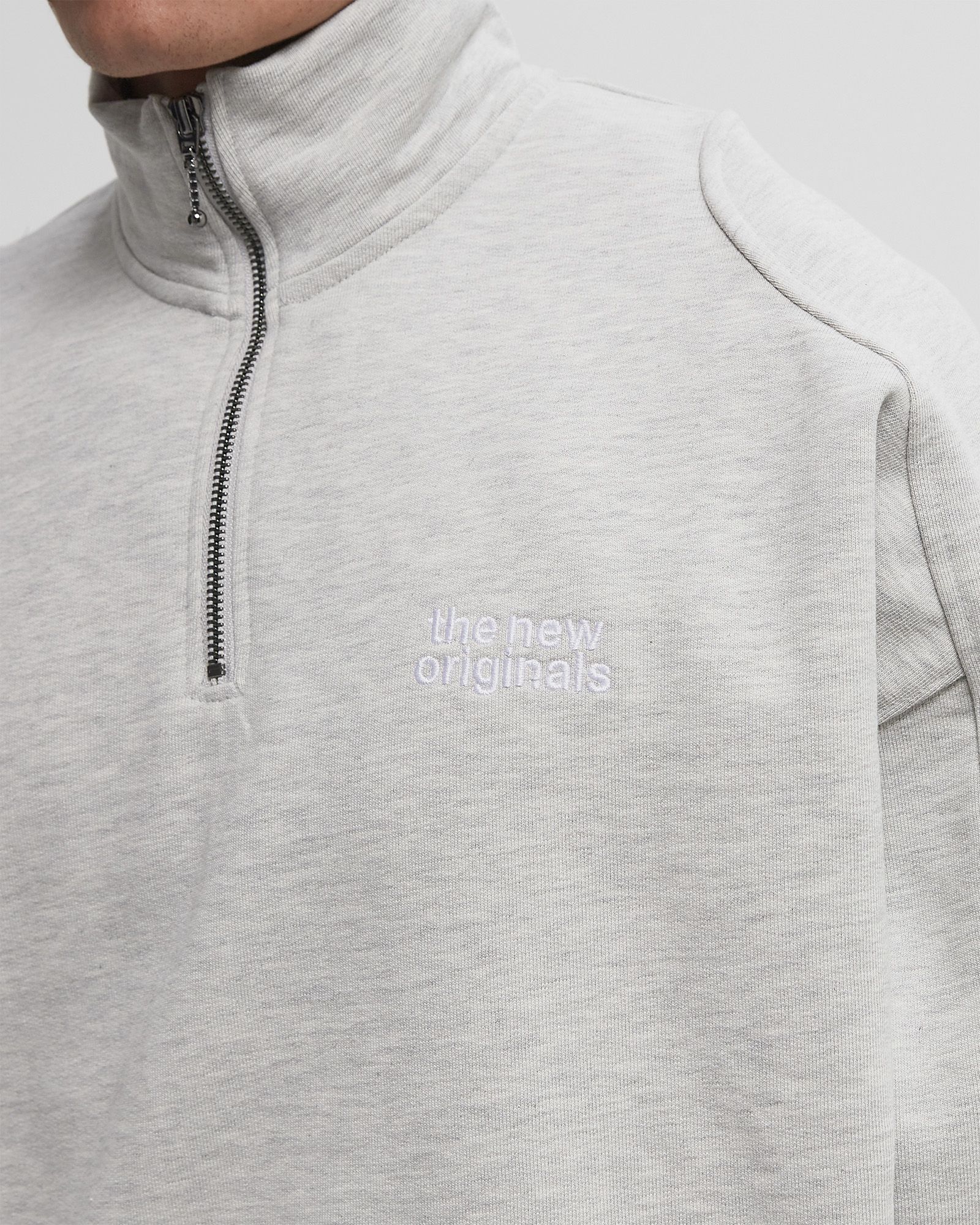 EMBLEM HALF-ZIP SWEATER