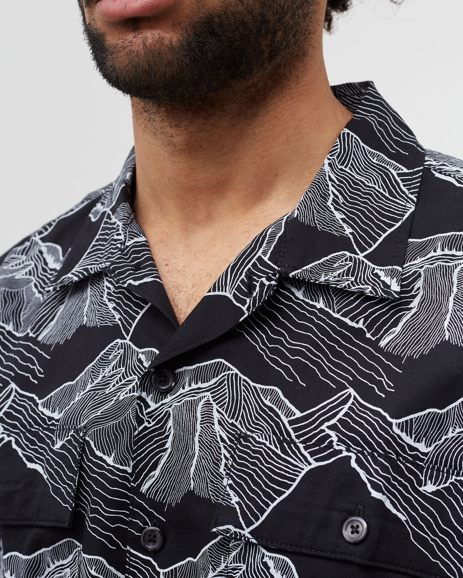 SKATEBOARDING BUTTON DOWN SHIRT