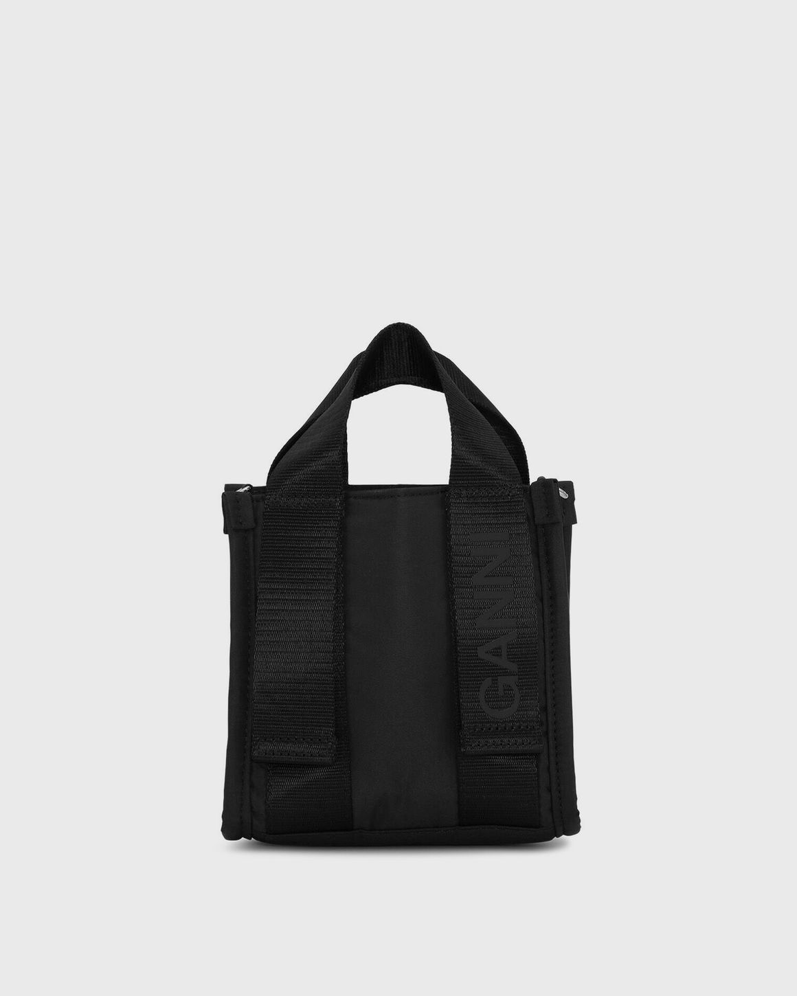 【GANNI】Recycled tech Mini Tote eyJidWNrZXQiOiJic3RuLWltYWdlLX