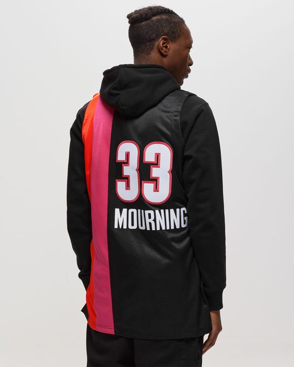 Mitchell & Ness Men's 2005 Miami Heat Alonzo Mourning #33 Pink Hardwood  Classics Swingman Jersey