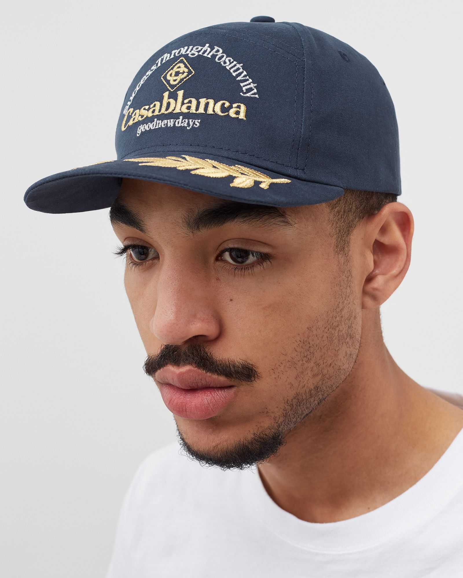 SUCCESS THROUGH POSITIVITY EMBROIDERED CAP