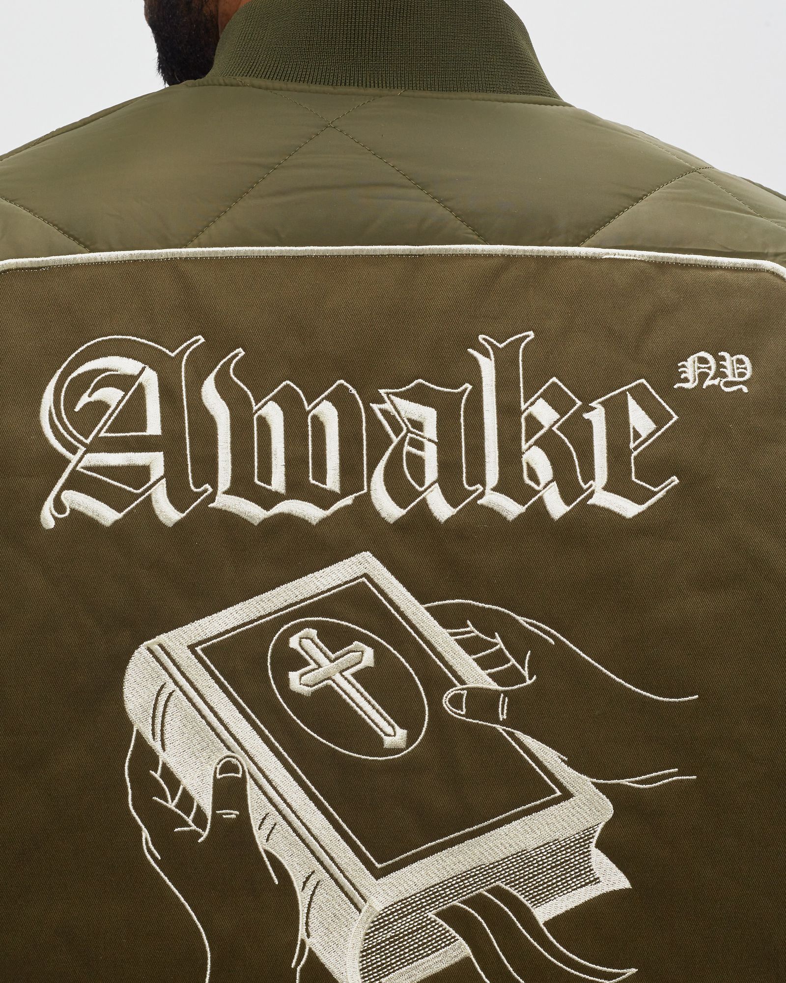 QUILTED PATCH BOMBER JACKET