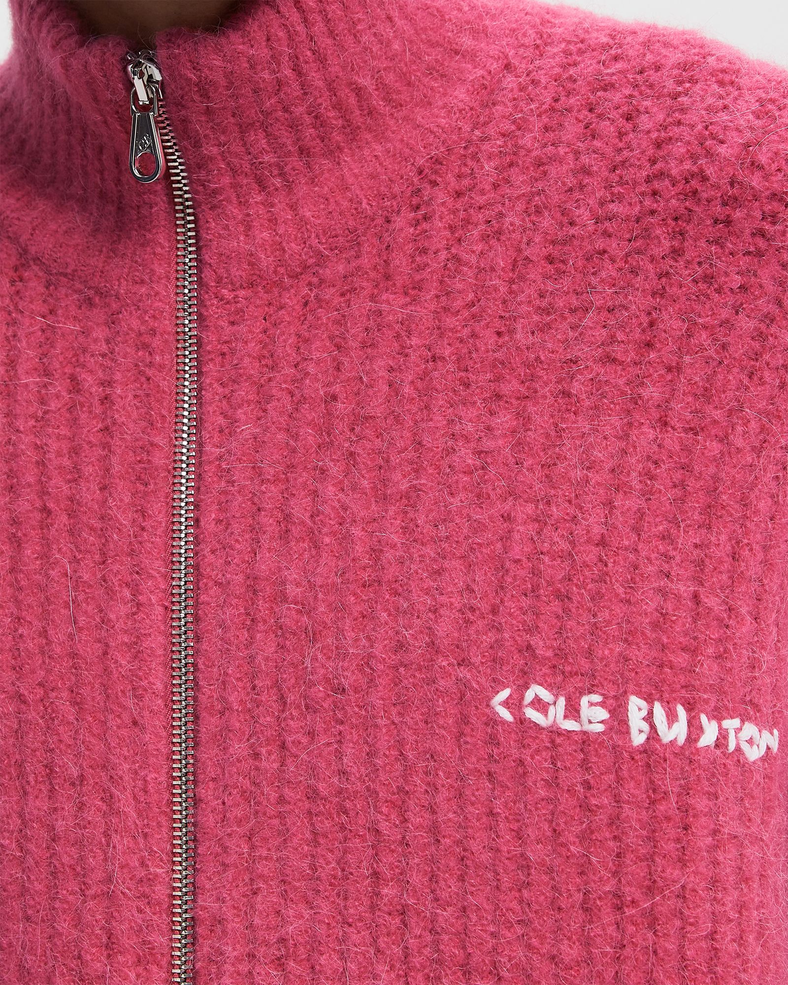 EMBROIDERED RIB KNIT ZIP THROUGH