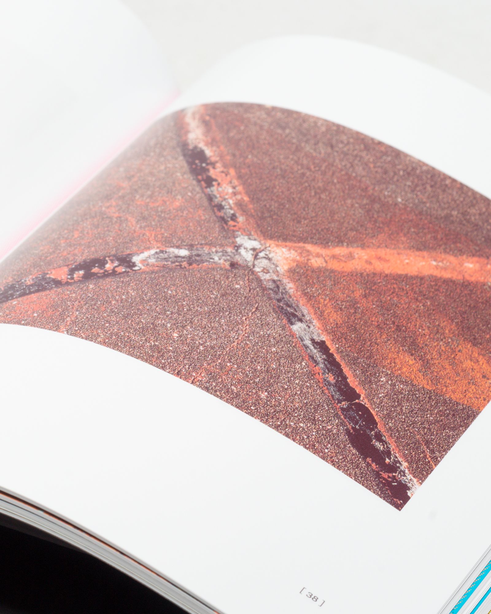 "Blacktop Memento: Fragments of Erosion" by Kevin Couliau