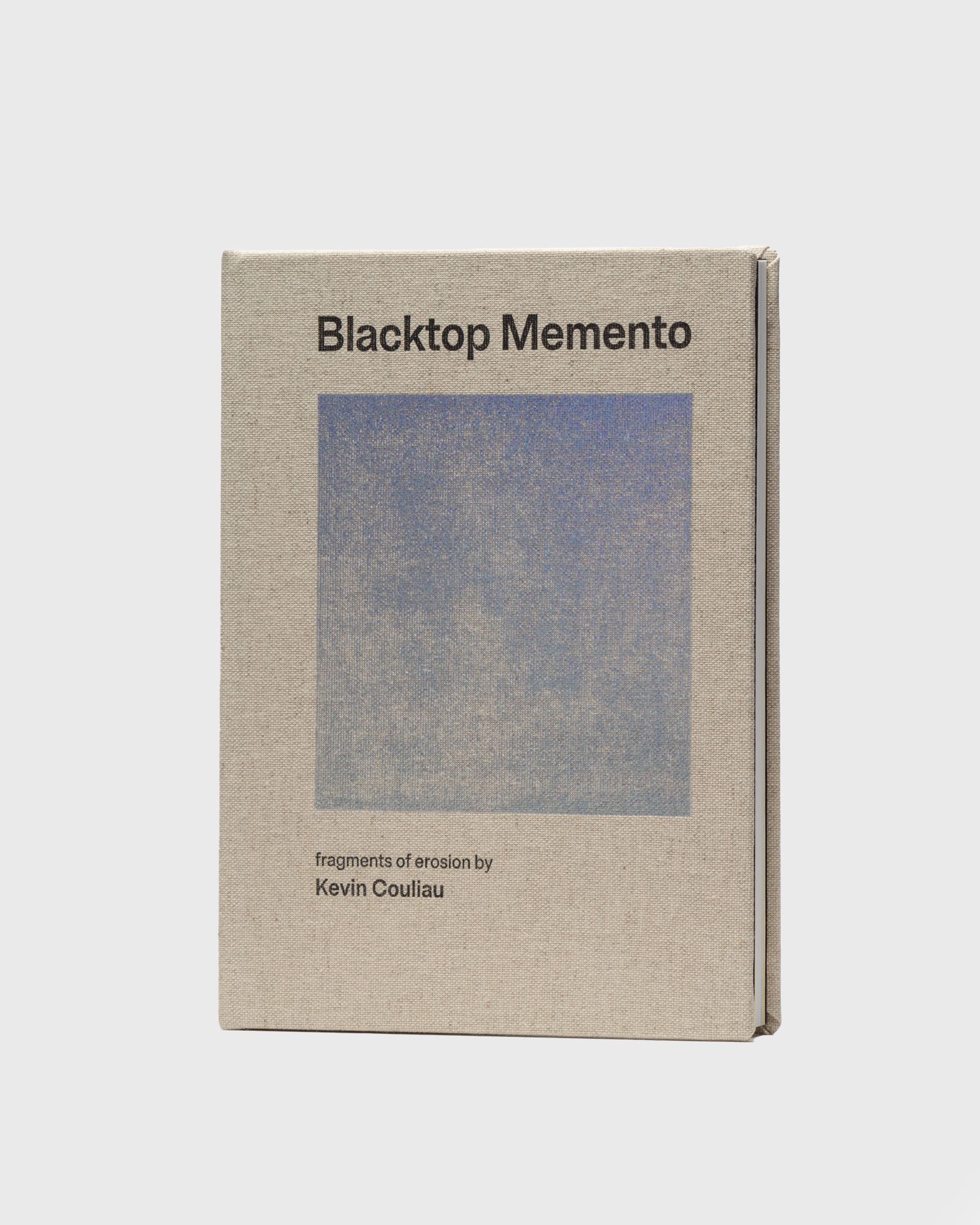 "Blacktop Memento: Fragments of Erosion" by Kevin Couliau