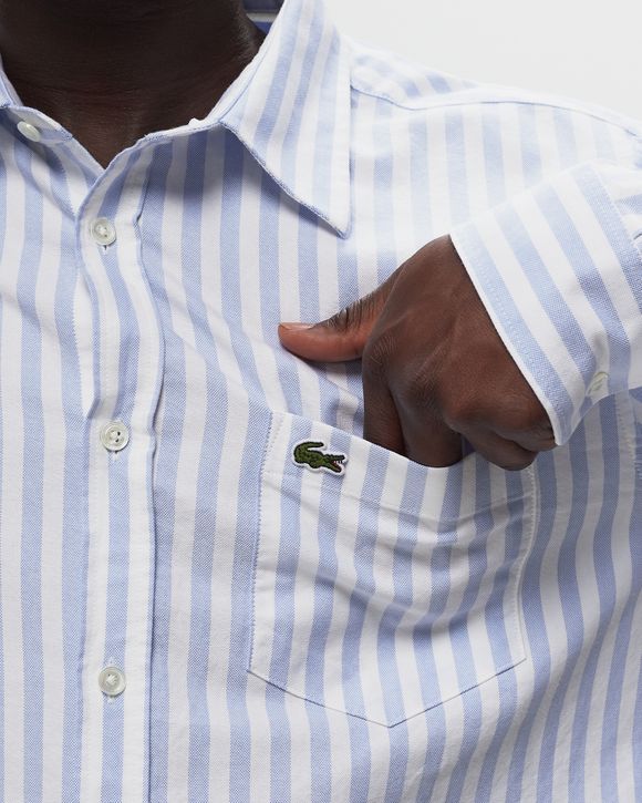 Lacoste blue and white striped shirt discount