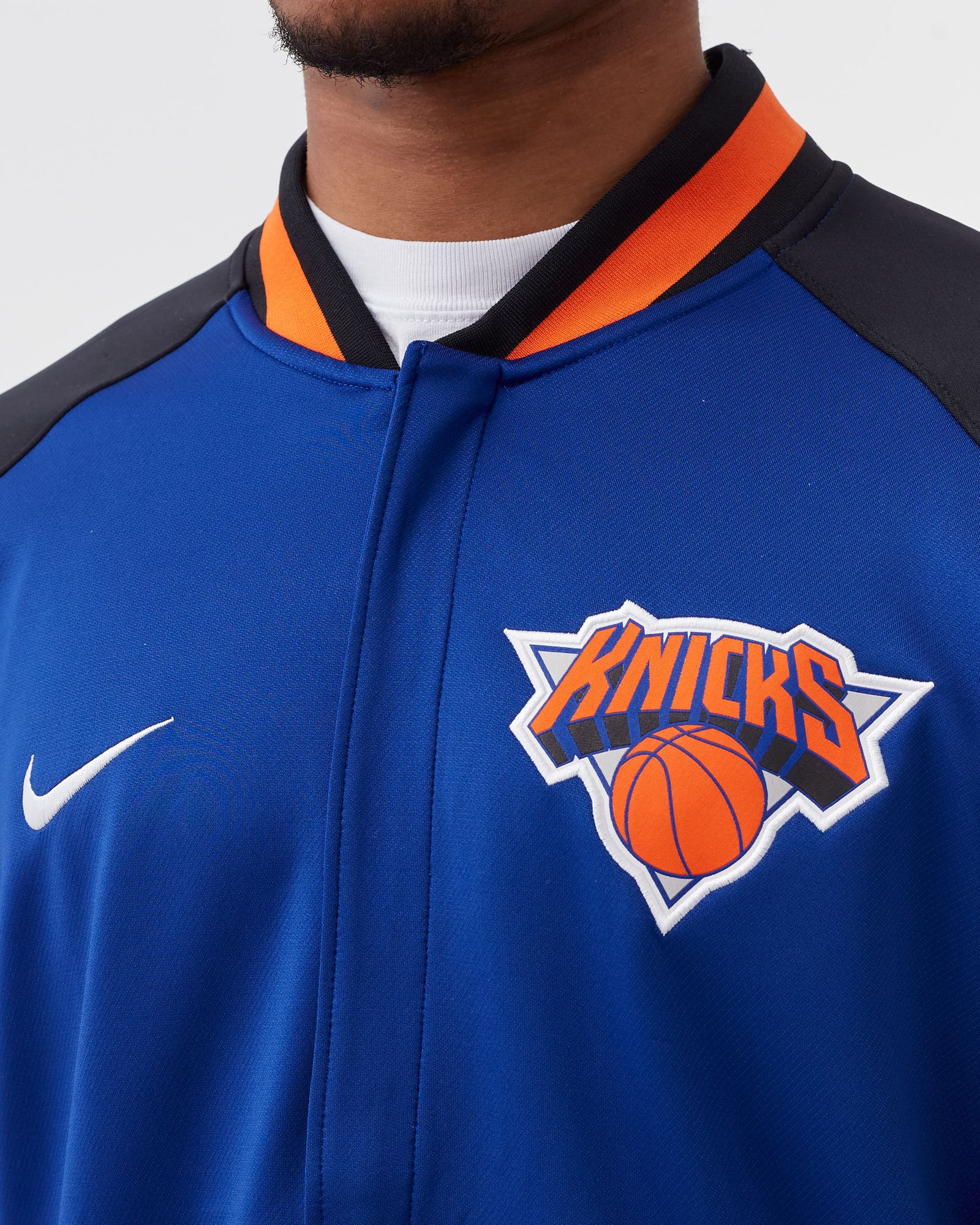 NIKE NEW YORK KNICKS スタジャン ニューヨークニックスNBA NBA公式 メンズ アウター バーシティジャケット スタジャン