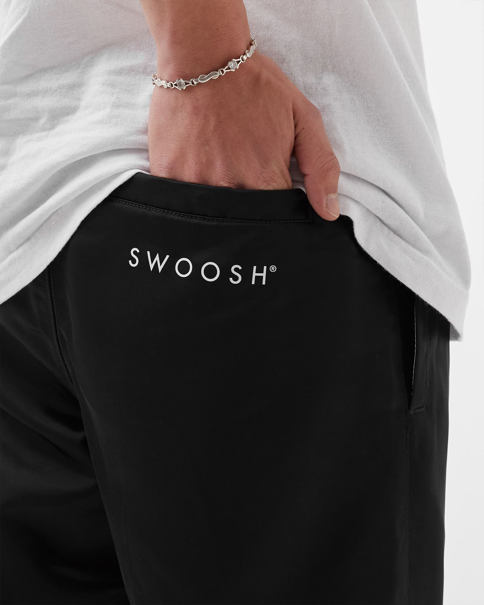 Swoosh Pants