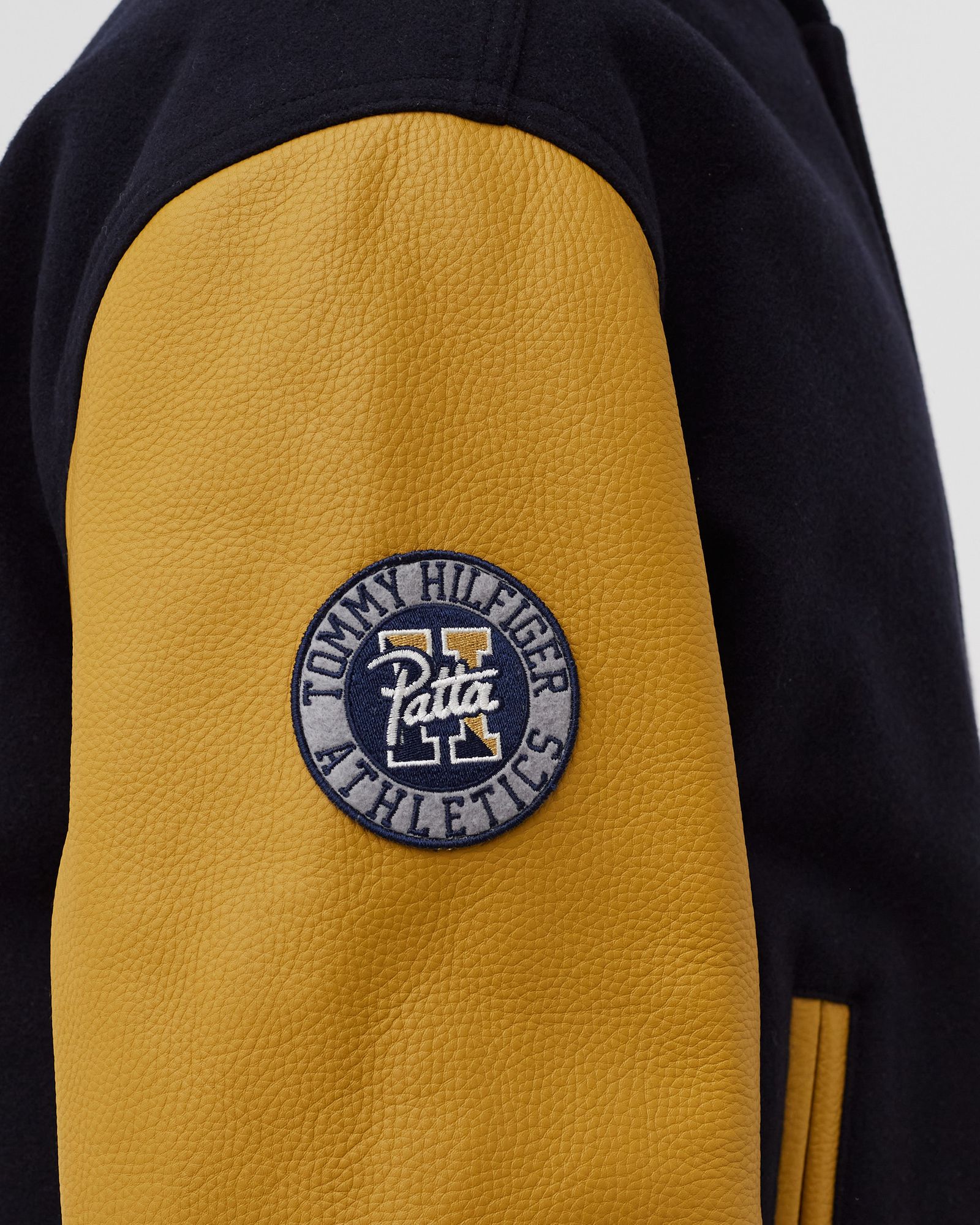 TOMMY JEANS X PATTA VARSITY JACKET