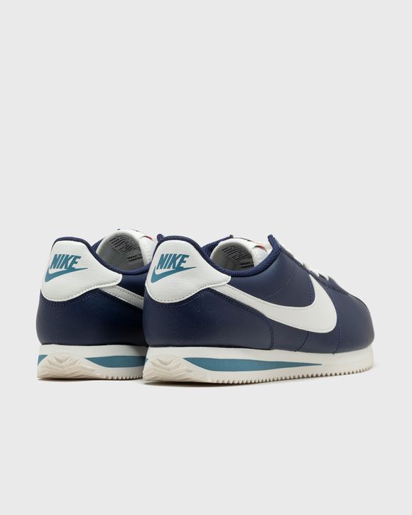 White and navy blue nike clearance cortez