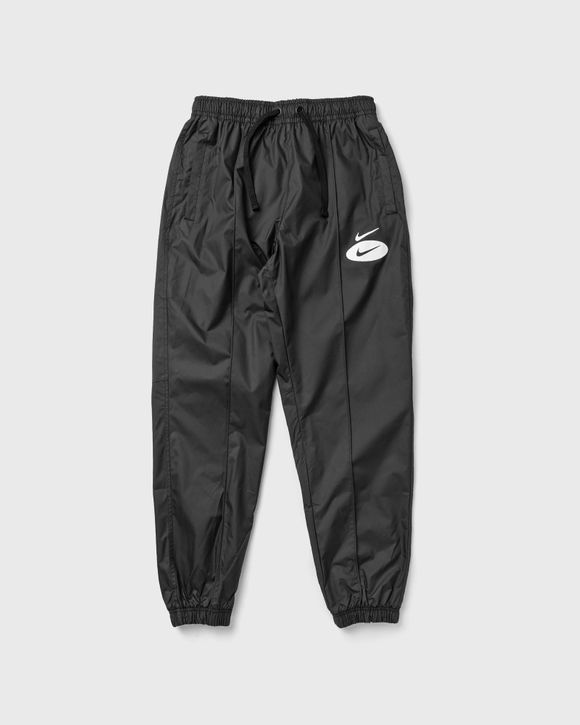 Nike swoosh 2024 woven pants