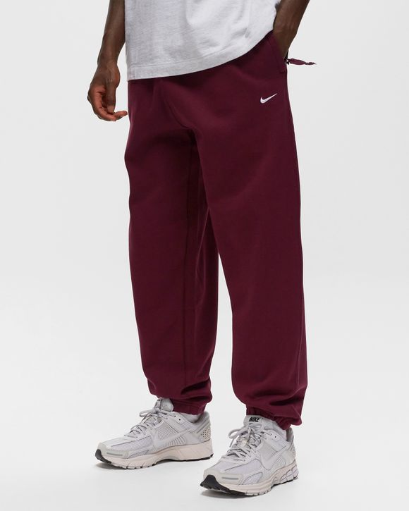 SOLO SWOOSH FLEECE PANTS TEAM RED – NRML