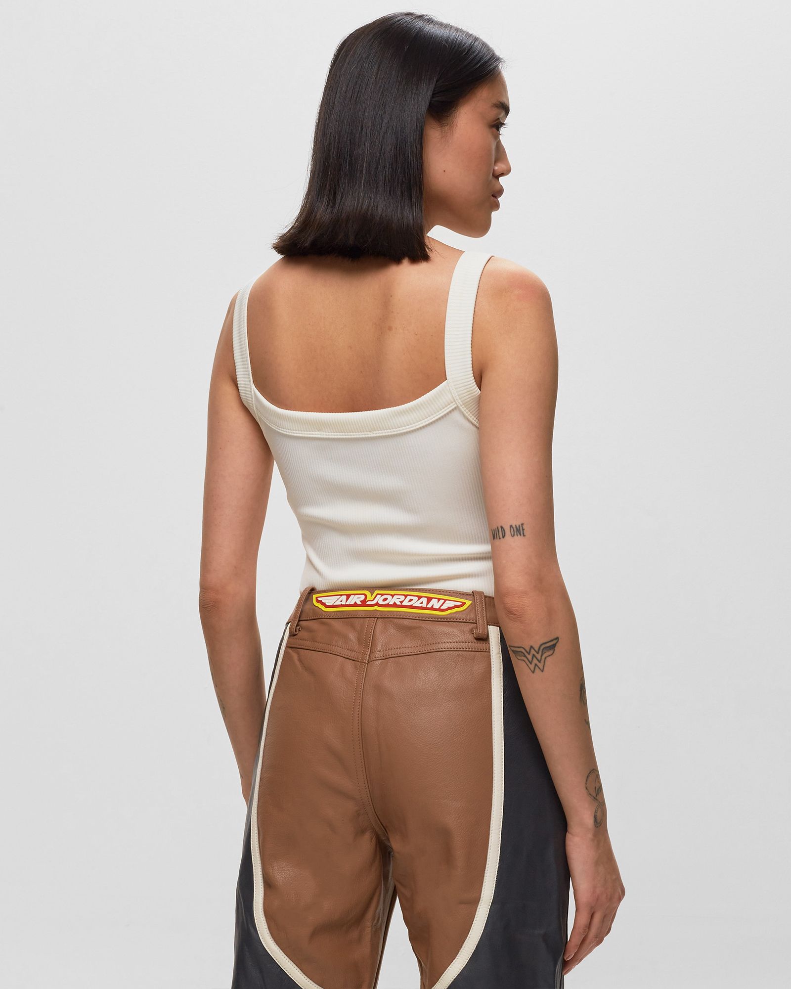 x TRAVIS SCOTT BODYSUIT