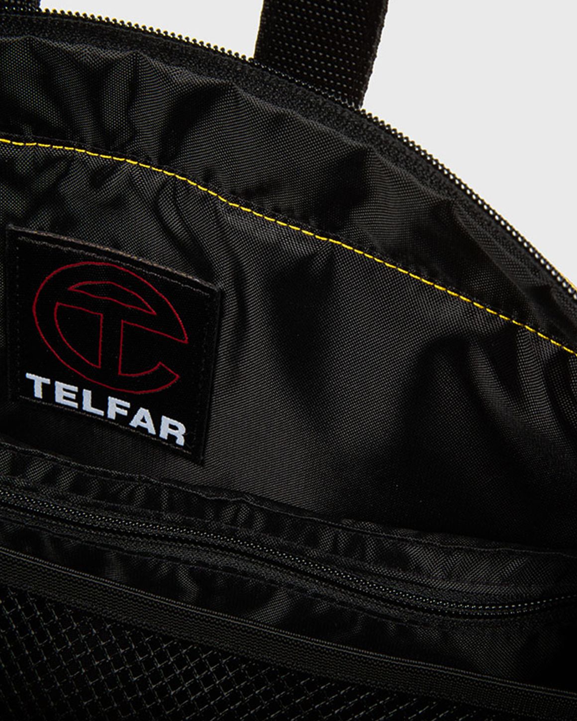 バッグ LIDAIRPEAKS 2 TONE SWITCHPACK yellow Eastpak TELFAR SHOPPER L Yellow | BSTN Store