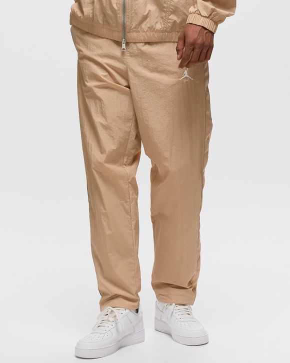 C.P. Company - Pantalón beige con bolsillo lateral diagonal y