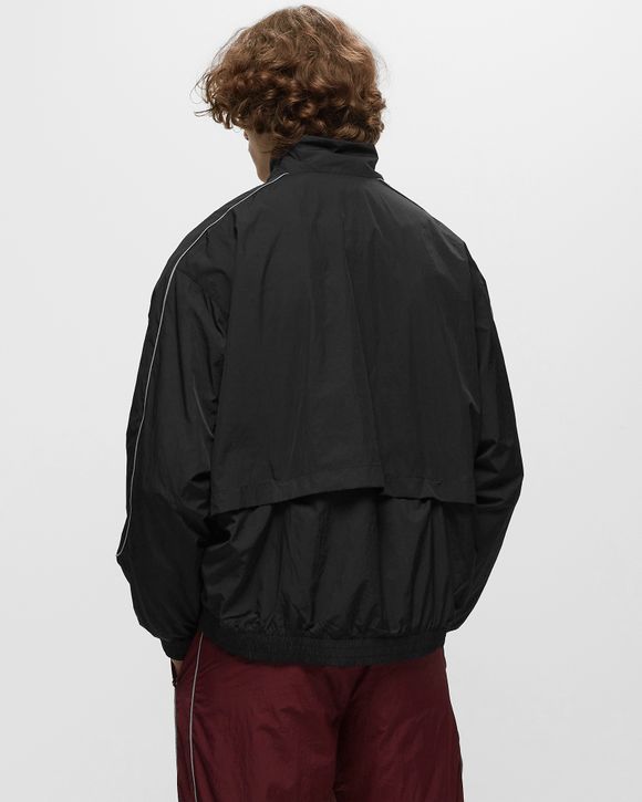 Nike Sportswear Solo Swoosh Men's Woven Track Jacket.