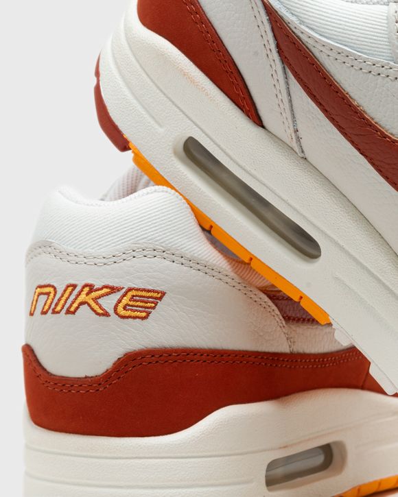 Nike Air Max 1 LX WMNS 'Rugged Orange' hiel en NIKE logo