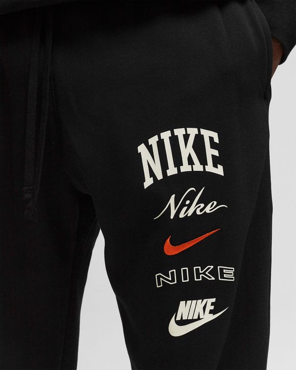 Nike gel tape cuffed track store pants black