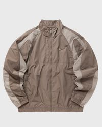 ジャケット・アウター NIKE x NOCTANRG CS WOVEN TRACK JACKET Nike X NOCTA NORTHSTAR NYLON TRACKSUIT JACKET Brown | BSTN Store