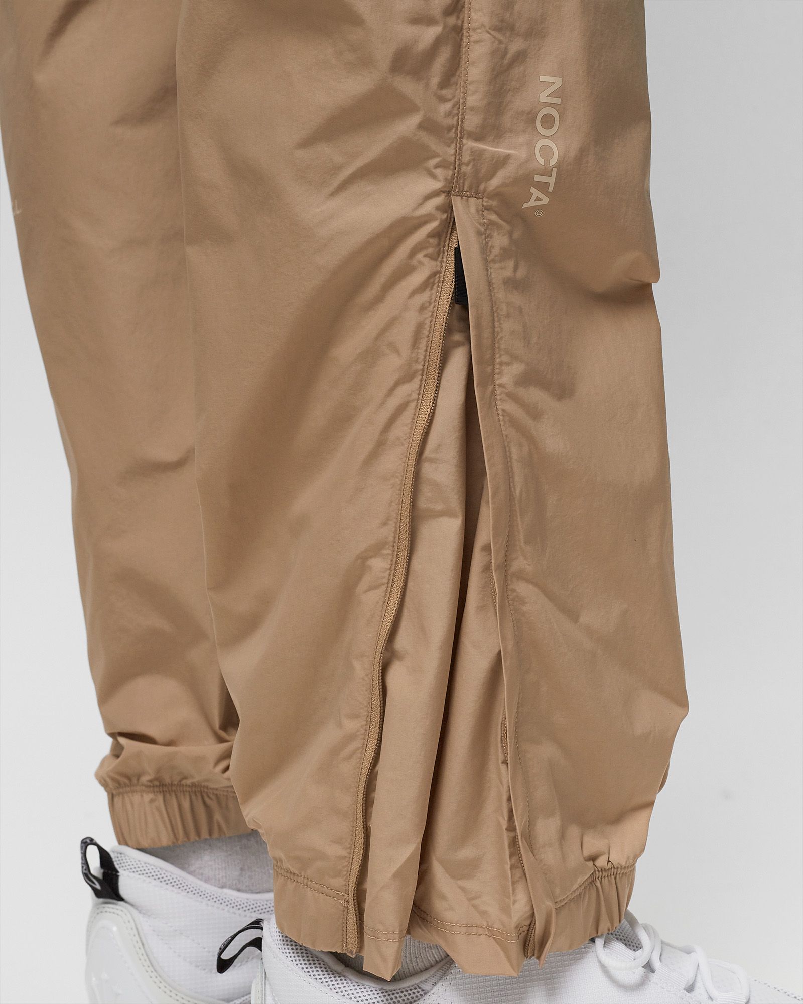 x NOCTA M NRG CS TRK PANT WVN