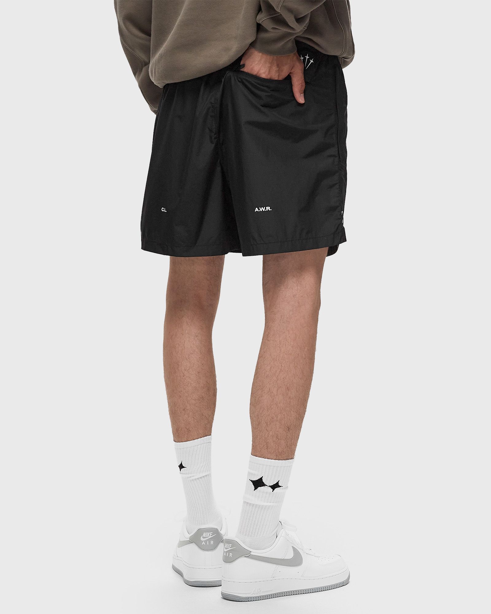 X NOCTA CARDINAL NYLON SHORTS