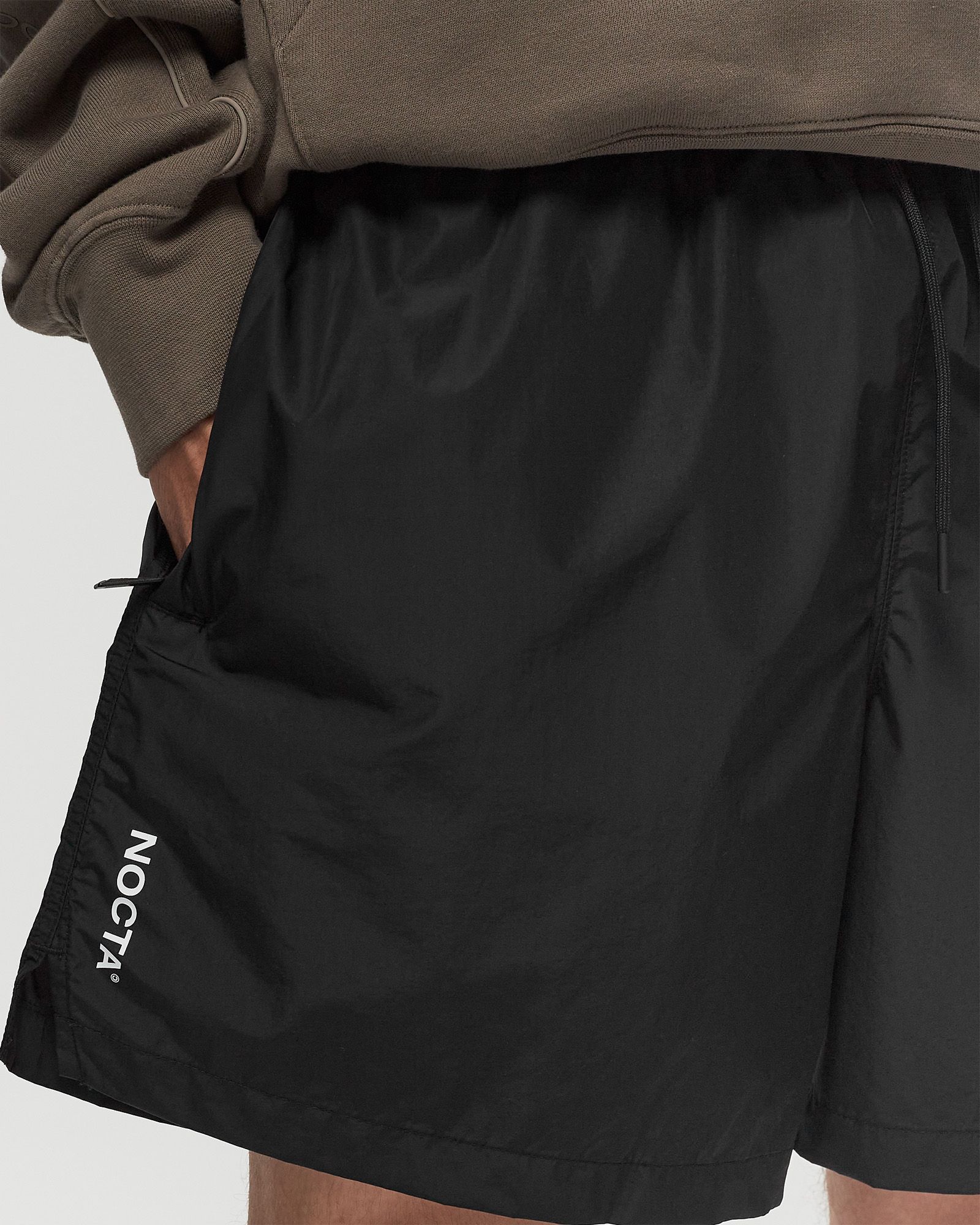 X NOCTA CARDINAL NYLON SHORTS