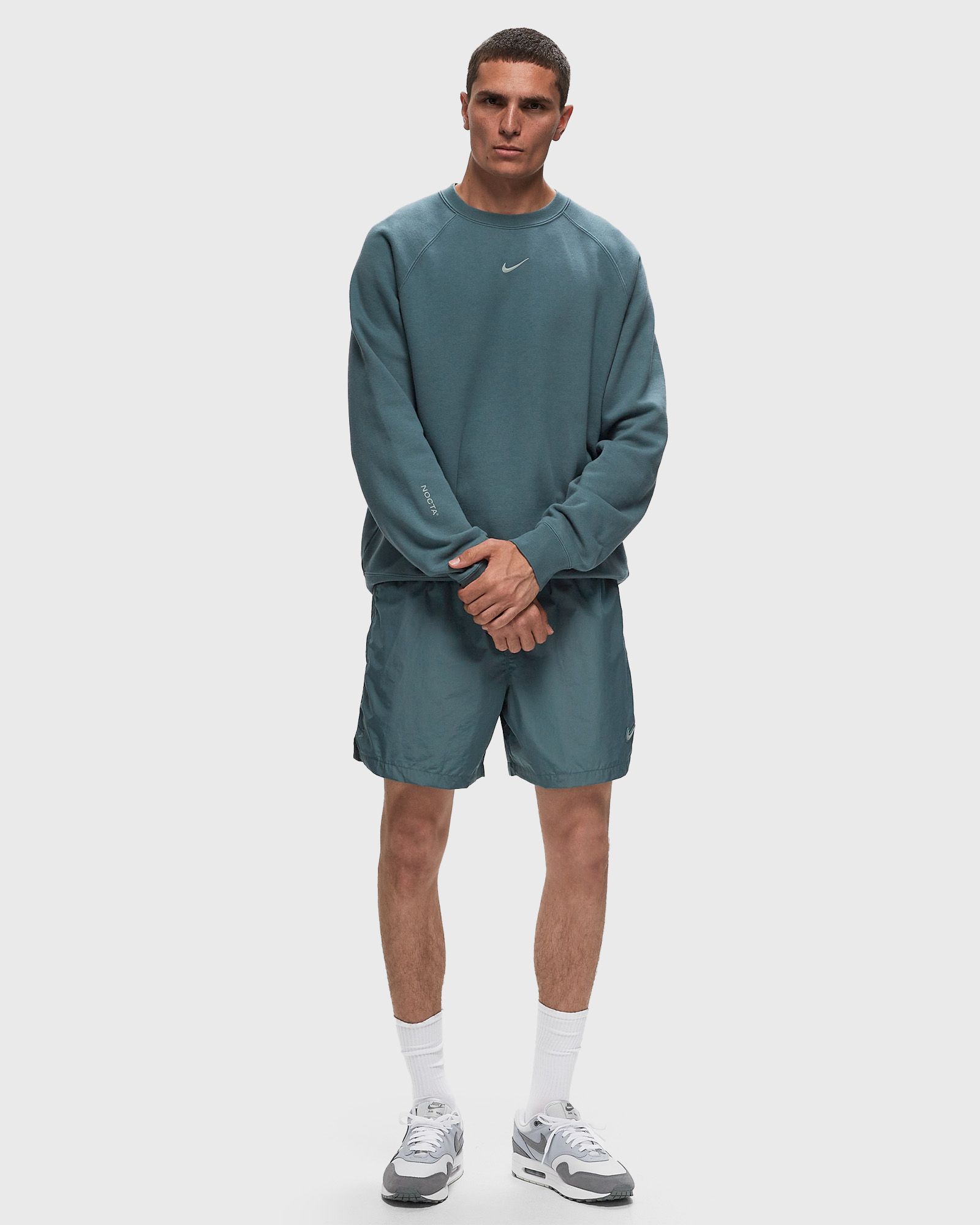 X NOCTA CARDINAL NYLON SHORTS