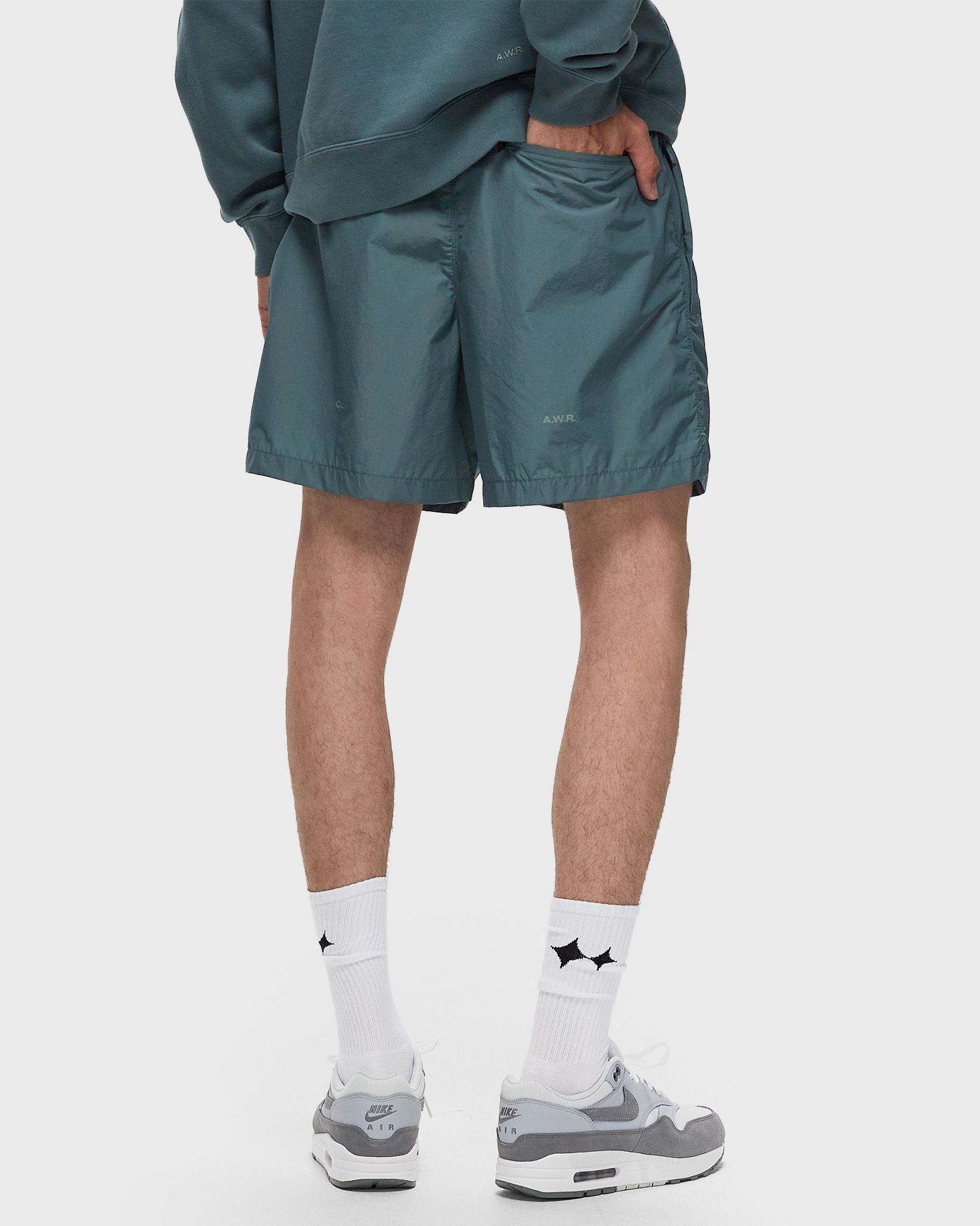 X NOCTA CARDINAL NYLON SHORTS