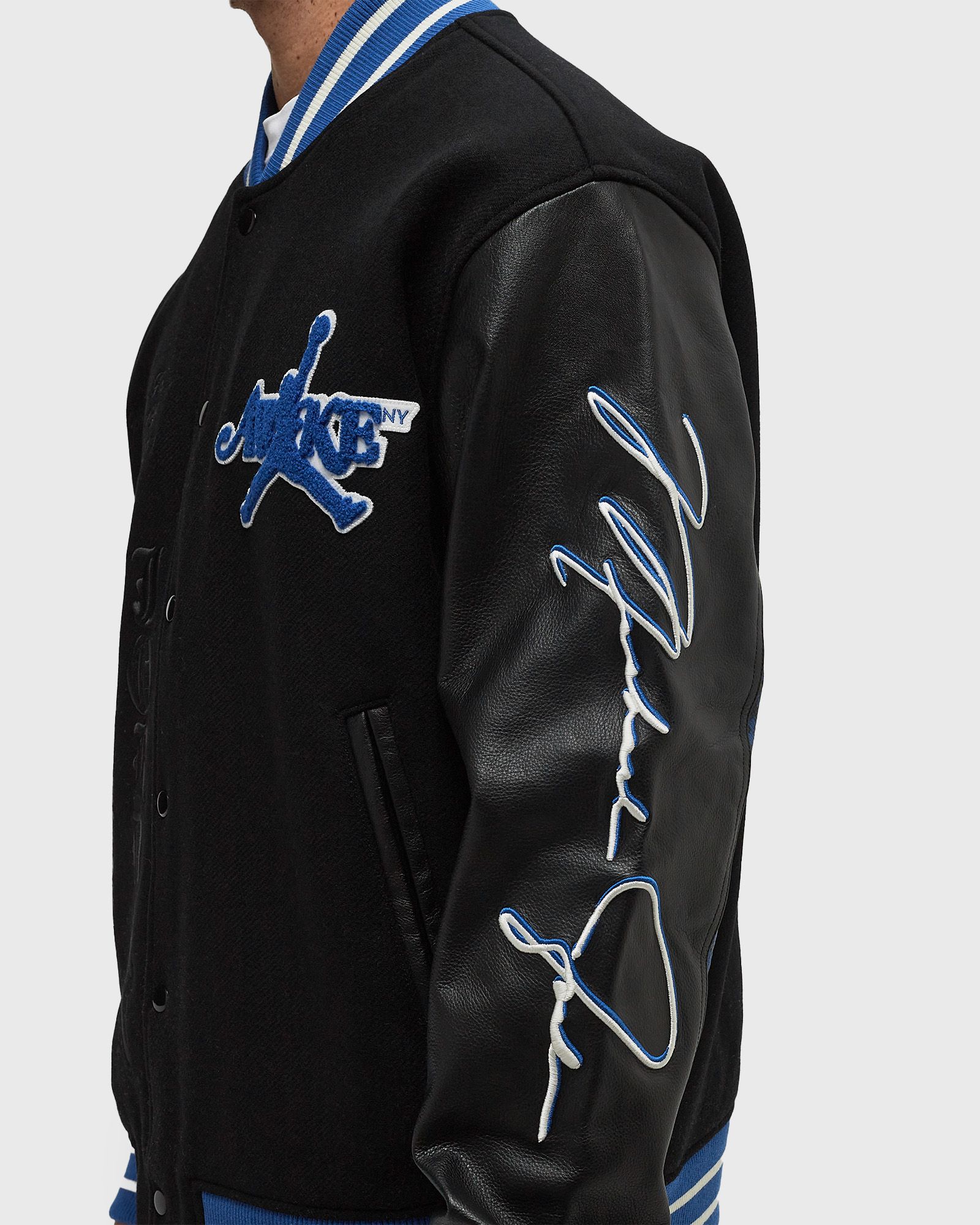 Jordan x AWAKE NY VARSITY JACKET Black Blue | BSTN Store