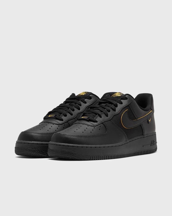 Black af1 on sale with yellow swoosh