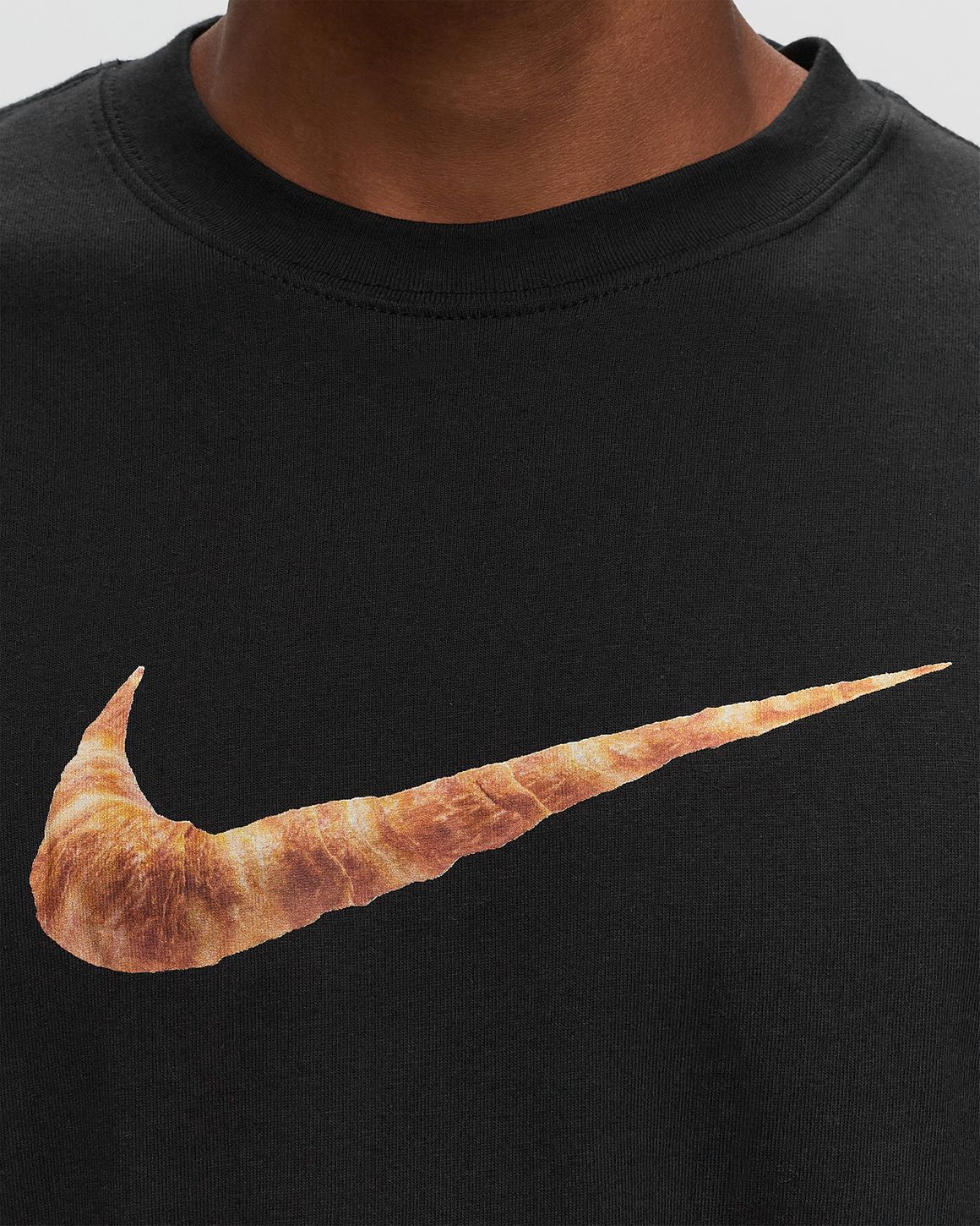 Black nike shirt with gold swoosh deals