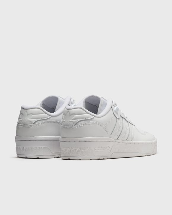 Adidas originals rivalry low store trainers in triple white