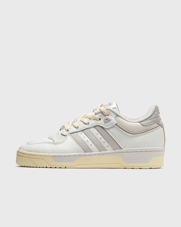 Adidas originals hotsell rivalry low zip