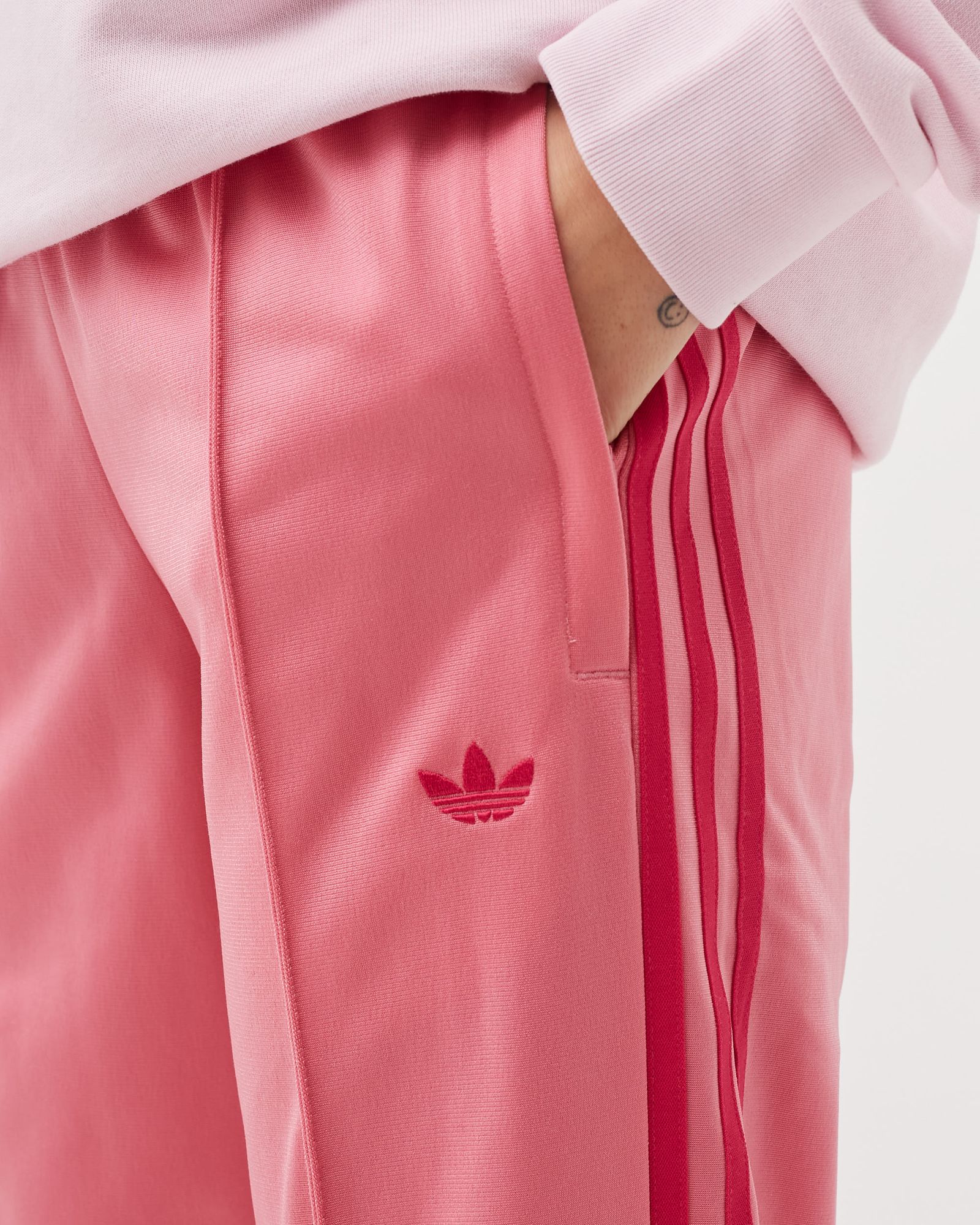 WMNS FLARED FIREBIRD FRONT-ZIP FLARED EFFECT PANTS