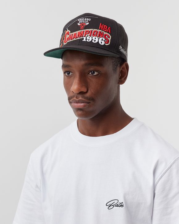 mitchell and ness snapback on head