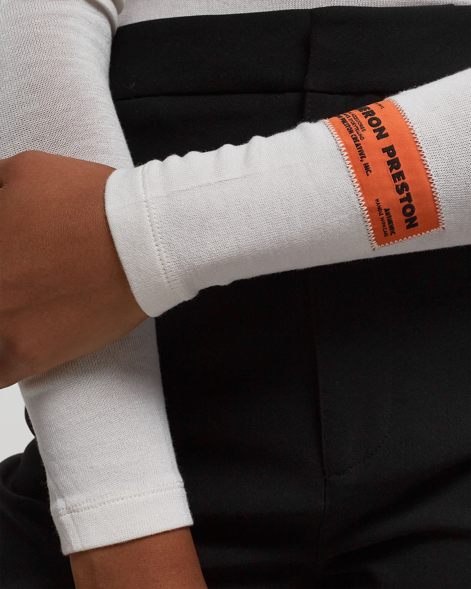 HPNY EMB CUT SHOULDER TOP