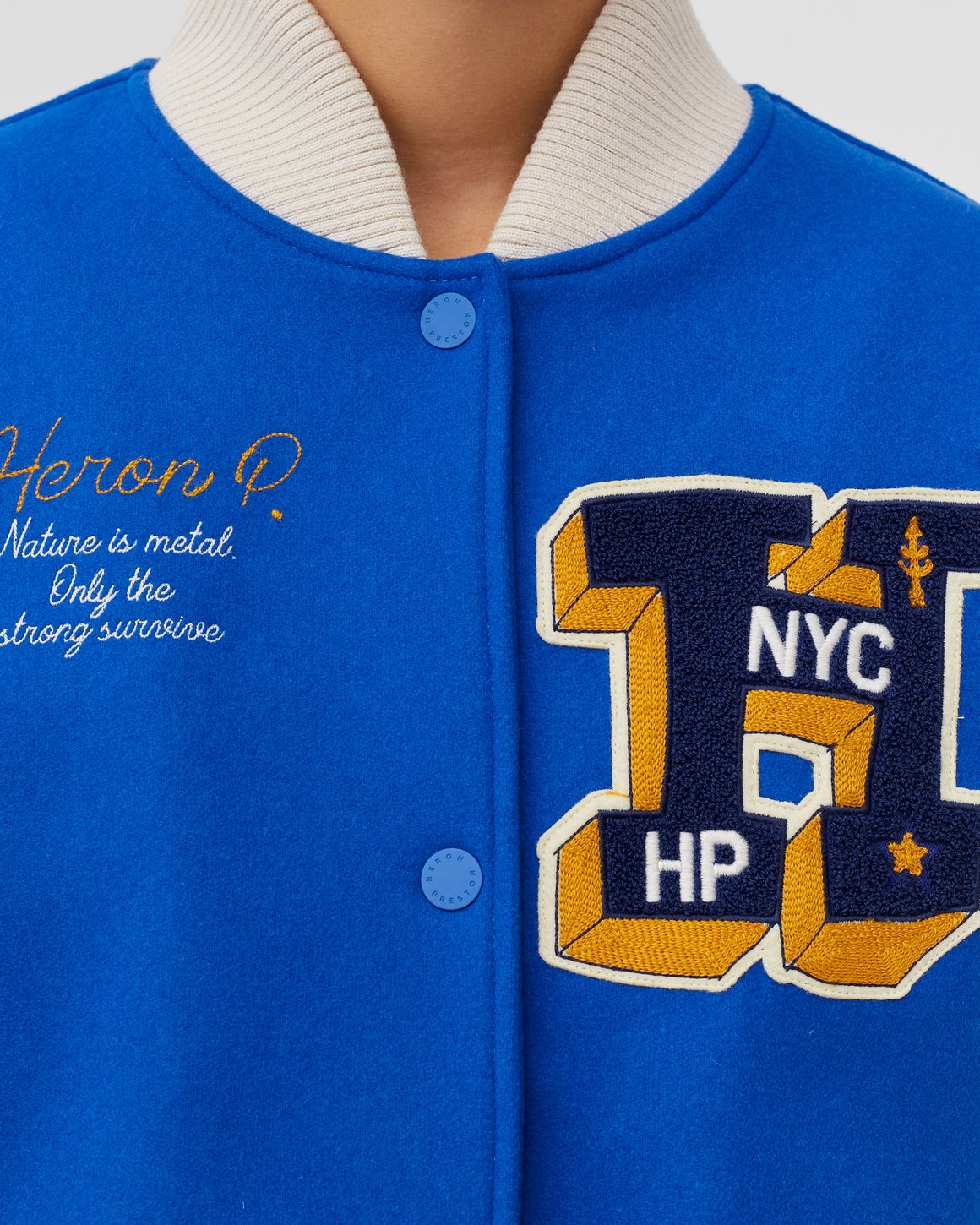 Heron Preston WMNS HERON PATCHES VARSITY JACKET Blue | BSTN