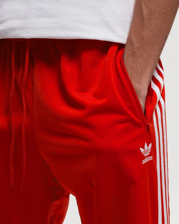 Red adidas firebird track pants hot sale