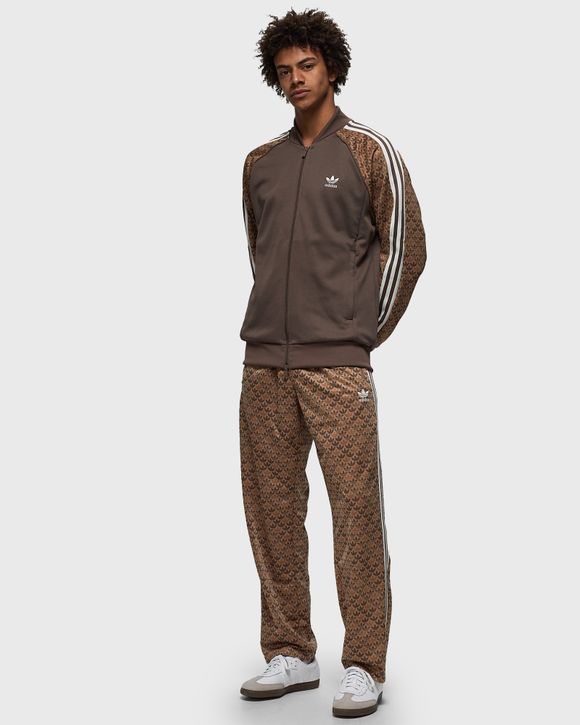 adidas Originals Retro Luxury track pants in brown with monogram print