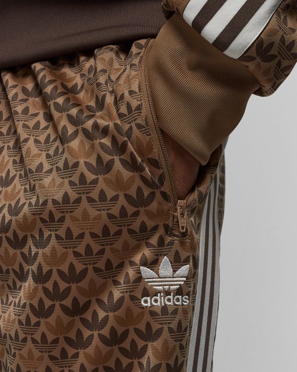 adidas Originals Retro Luxury track pants in brown with monogram print