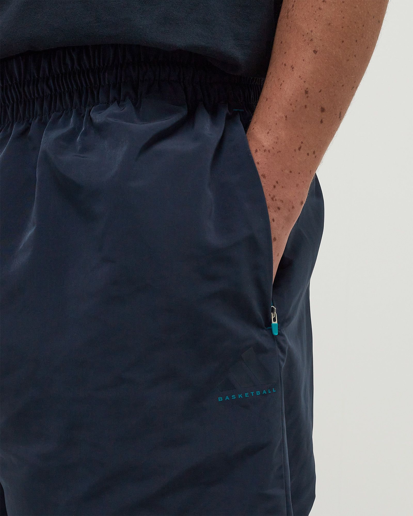 Adidas BASKETBALL WOVEN SNAP TRACKSUIT BOTTOMS Blue | BSTN Store