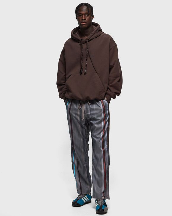 adidas Originals Retro Luxury track pants in brown with monogram print