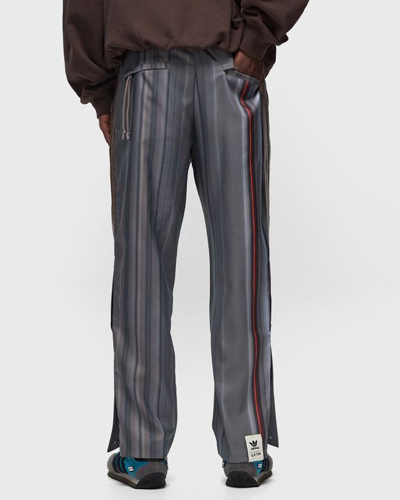 adidas Originals Retro Luxury track pants in brown with monogram print