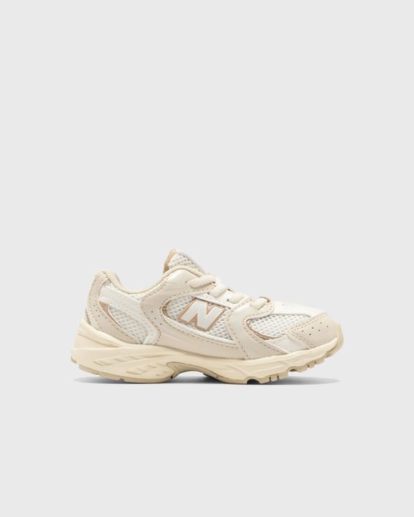 New Balance Kids 530 Bungee in Beige Synthetic Size 27.5