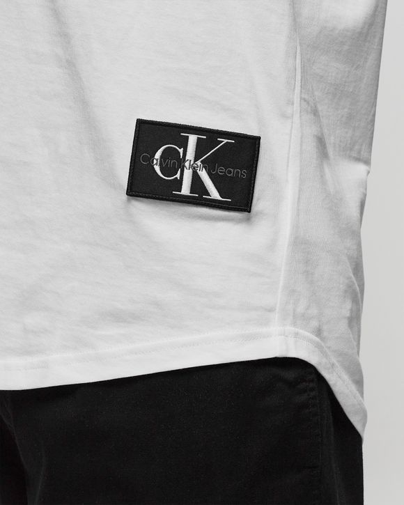 Calvin Klein White TANK Store Jeans MONOLOGO | BSTN BADGE