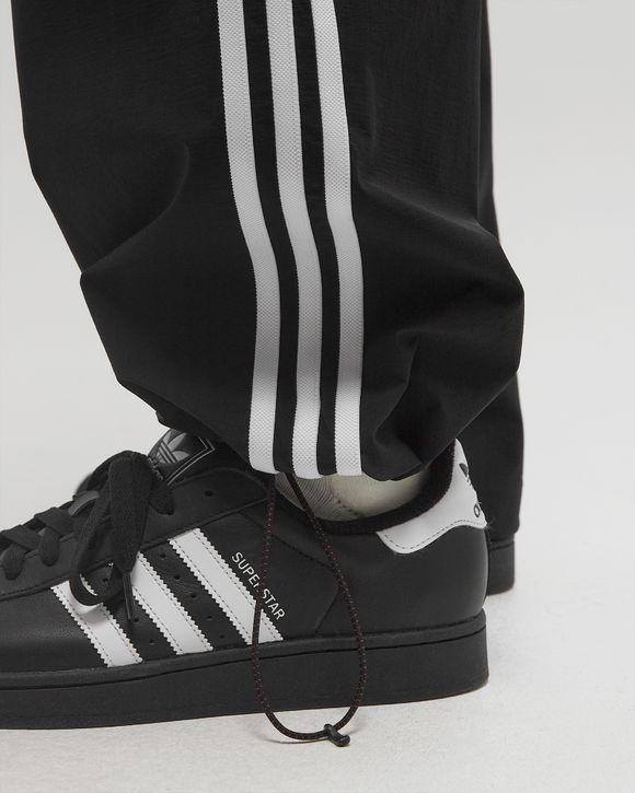 Adidas x 100 Thieves ZIP PANT Black | BSTN Store