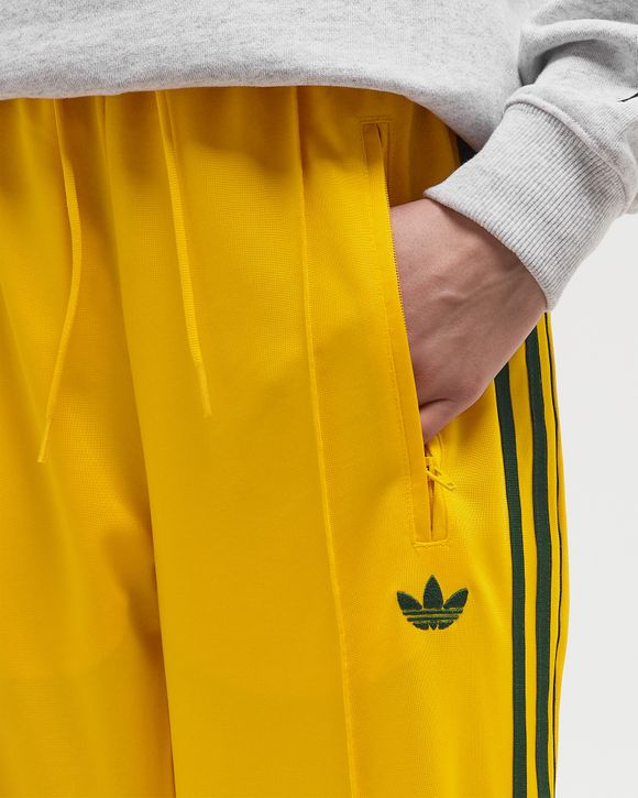 Adidas WMNS FIREBIRD TRACK PANT Yellow | BSTN Store
